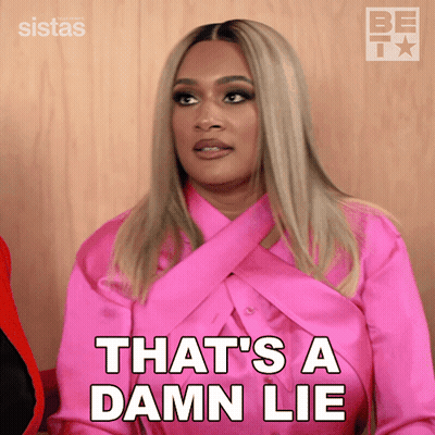 Woman In Pink Shirt Saying That's A Damn Lie GIF