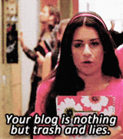 Woman In Pink Shirt Saying Your Blog Trash And Lies GIF