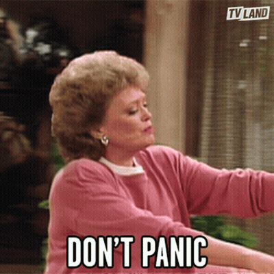 Woman In Pink Shirt Says Don't Panic GIF