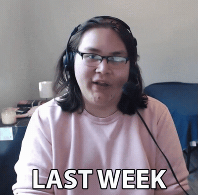 Woman In Pink Shirt Wearing Headphones GIF