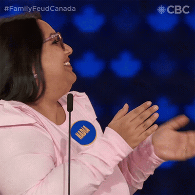 Woman In Pink Shirt With Nadya Name Tag GIF