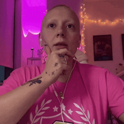 Woman In Pink Shirt With Number 1 Screaming GIF