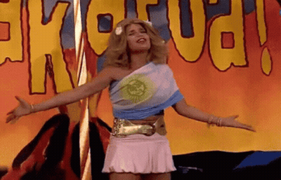 Woman In Pink Skirt At Exotica Sign GIF