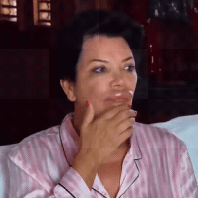Woman In Pink Striped Pajama Covering Mouth GIF