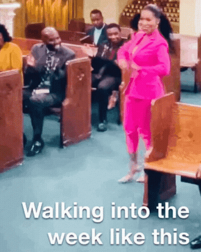 Woman In Pink Suit Walking Into Church GIF