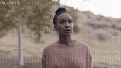 Woman In Pink Sweater In Field GIF