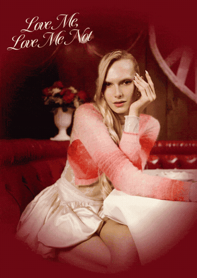 Woman In Pink Sweater Love Me Love Me Not GIF