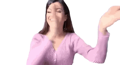 Woman In Pink Sweater Making Heart Sticker