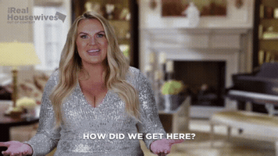 Woman In Pink Sweater Saying I Am Overwhelmed GIF