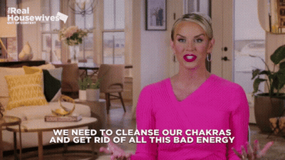 Woman In Pink Sweater Saying We Need To Cleanse Our Chakras GIF