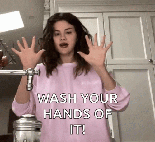 Woman In Pink Sweater Telling To Wash Hands GIF