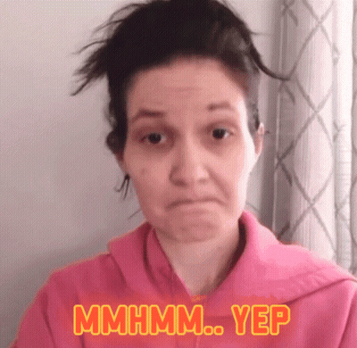 Woman In Pink Sweatshirt Making Funny Face GIF