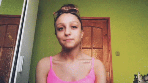 Woman In Pink Tank Top GIF