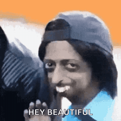 Woman In Pink Tank Top And White Jacket GIF