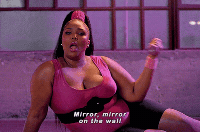 Woman In Pink Tank Top Holding Dumbbell Mirror Mirror On The Wall GIF