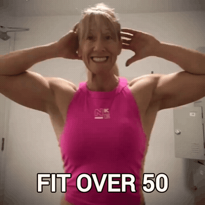 Woman In Pink Tank Top Saying Fit Over 50 GIF