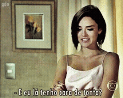 Woman In Pink Tank Top Says E Eu La Tenho Cara De Tonta GIF