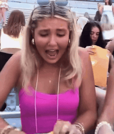 Woman In Pink Tank Top Screaming In Crowd GIF