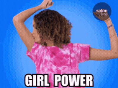 Woman In Pink Tie Dye Shirt Flexing Girl Power GIF