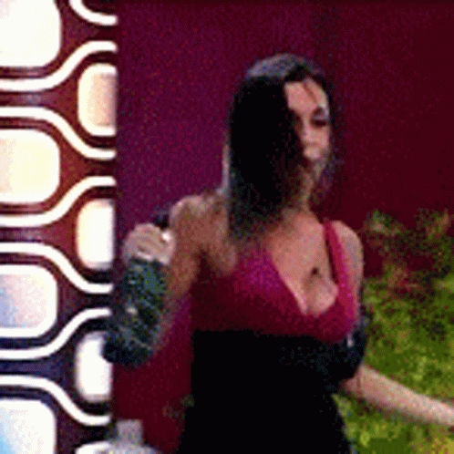 Woman In Pink Top And Black Skirt Dancing GIF