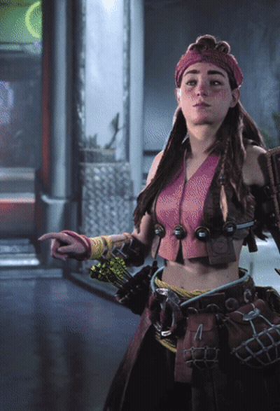 Woman In Pink Top And Red Headband Pointing GIF