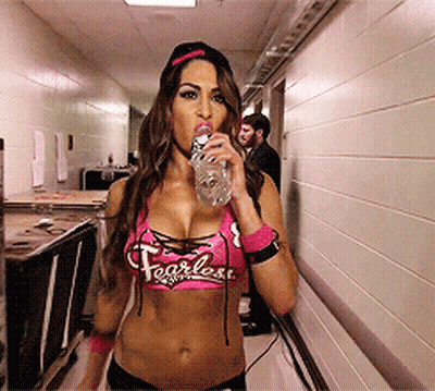 Woman In Pink Top Saying Fearless Drinks Water GIF
