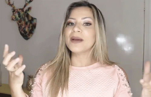Woman In Pink Top Talking GIF