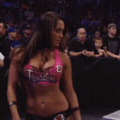 Woman In Pink Top With Number 8 GIF