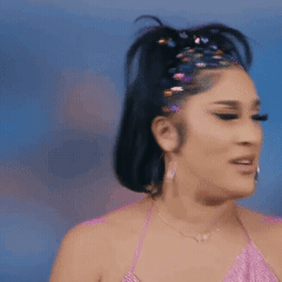 Woman In Pink Top With Rhinestone Headband GIF