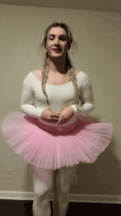 Woman in Pink Tutu and White Top