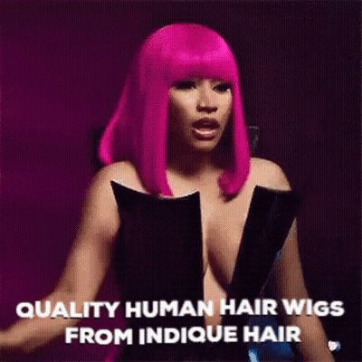 Woman In Pink Wig And Black Dress Talking About Indicue Hair GIF