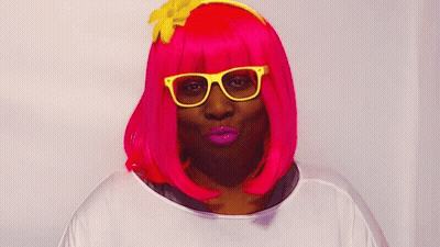 Woman In Pink Wig And Yellow Glasses GIF