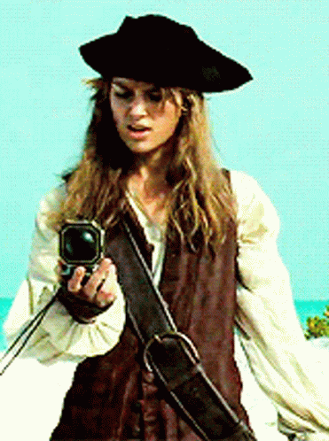 Woman In Pirate Outfit Holding Gun GIF