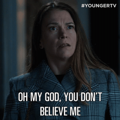 Woman In Plaid Coat Says Oh My God You Don't Believe Me GIF