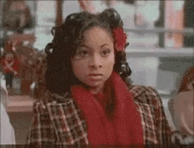 Woman In Plaid Jacket And Red Scarf GIF