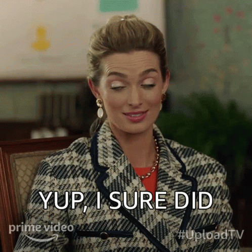 Woman In Plaid Jacket Saying Yup GIF