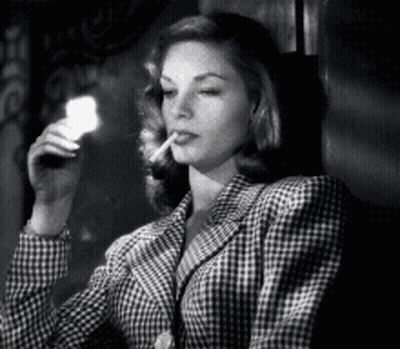 Woman In Plaid Jacket Smoking Cigarette Holding Flashlight GIF