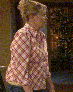 Woman in Plaid Shirt and Jeans
