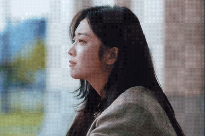 Woman In Plaid Shirt Close Up GIF