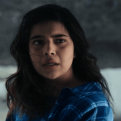 Woman In Plaid Shirt Close Up GIF