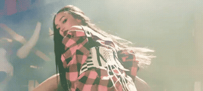 Woman In Plaid Shirt Dancing On Stage GIF