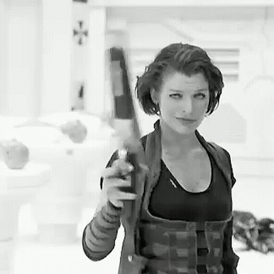 Woman In Plaid Shirt Holding Gun Black And White GIF