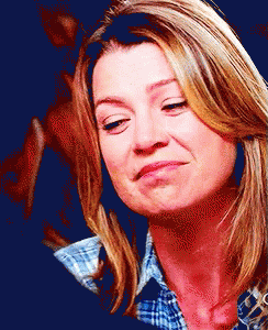 Woman In Plaid Shirt Making A Face GIF