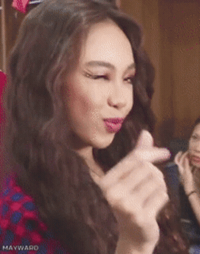 Woman In Plaid Shirt Making Funny Face GIF