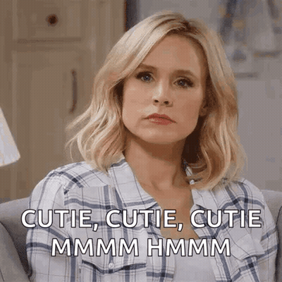 Woman In Plaid Shirt Saying Cutie Cutie Cutie GIF
