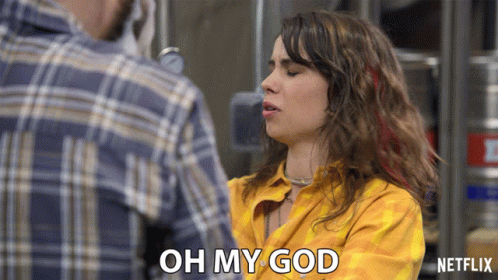 Woman In Plaid Shirt Saying Oh My God GIF