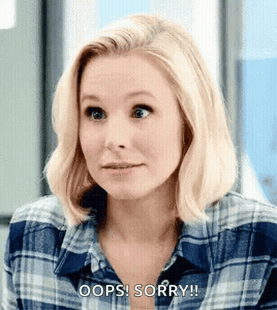 Woman In Plaid Shirt Saying Oops Sorry GIF