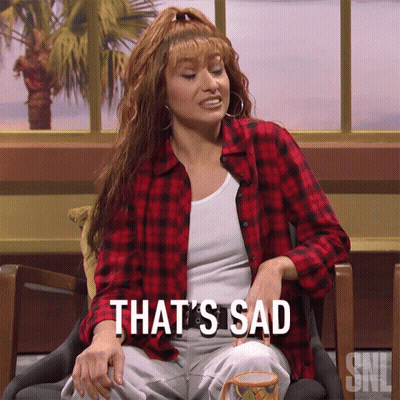 Woman In Plaid Shirt Saying That's Sad GIF
