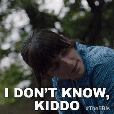 Woman In Plaid Shirt Says I Don't Know Kiddo GIF