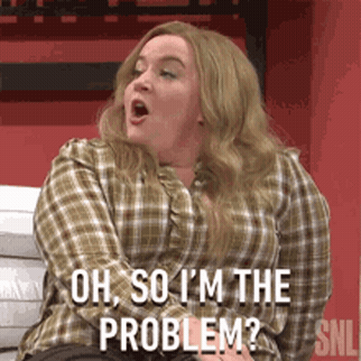 Woman In Plaid Shirt Sitting Talking About Problem GIF